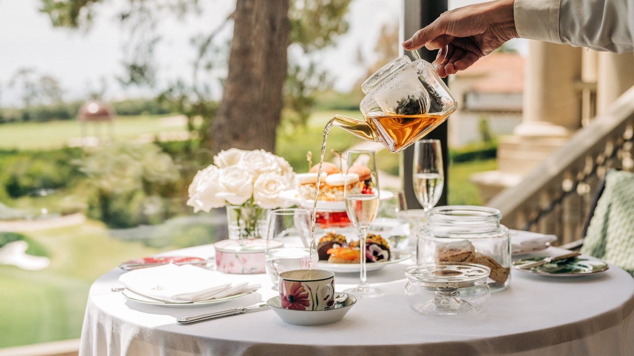 afternoon tea table set on terrace