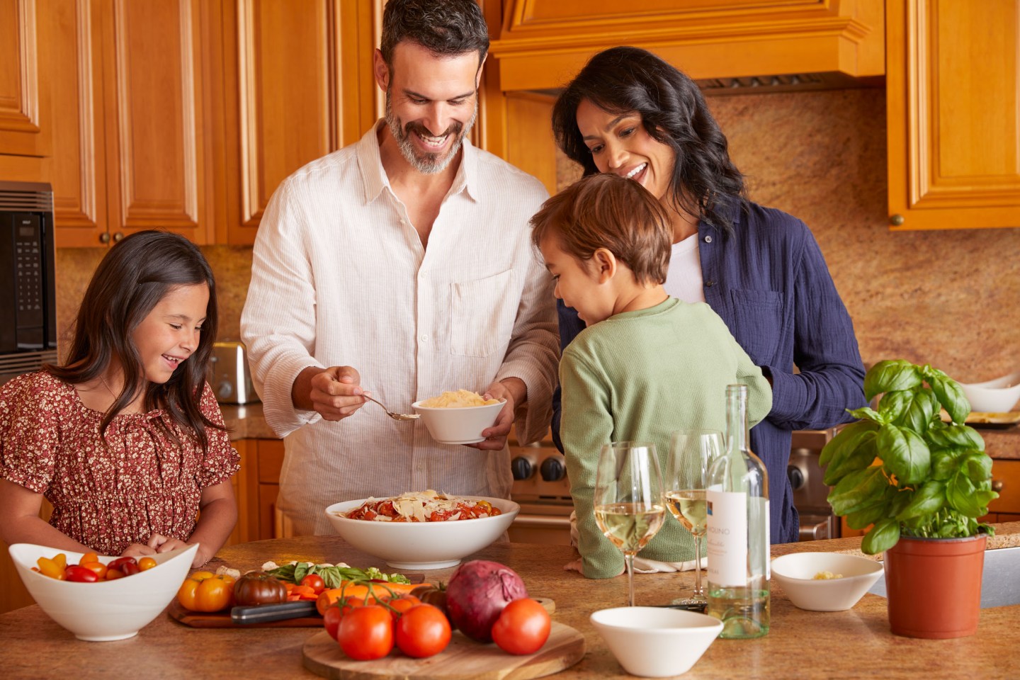 Family having dinner in villa