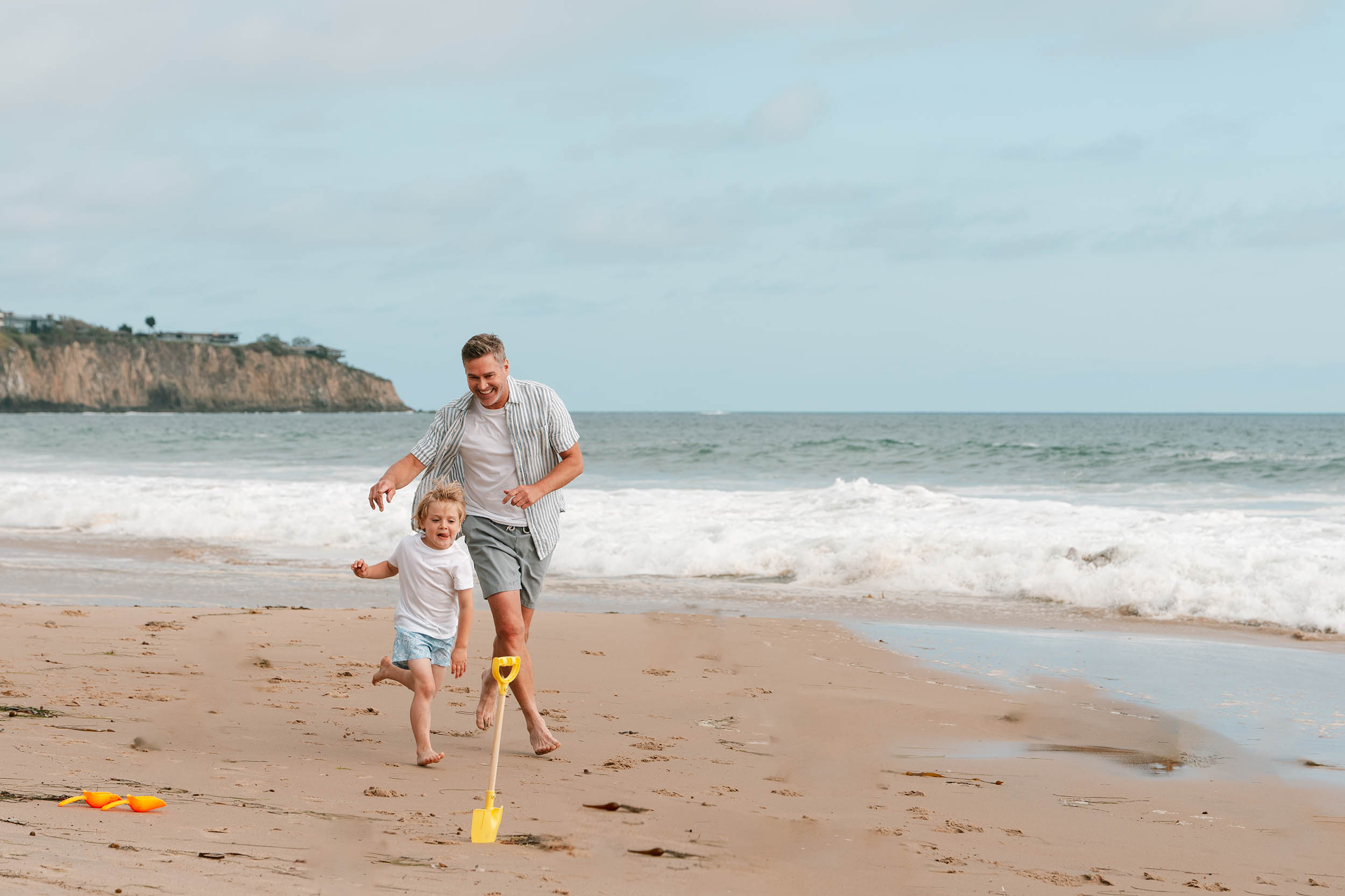 father son crystal cove beach