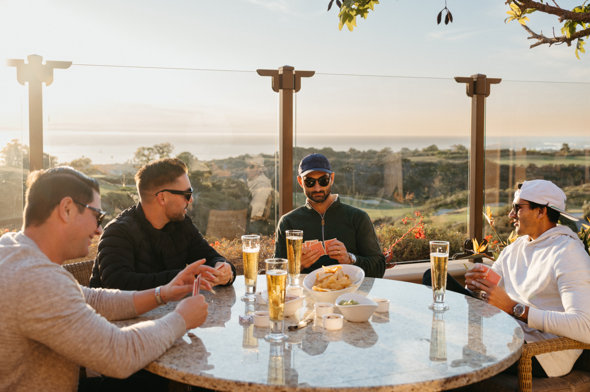 golf buddies dining on terrace